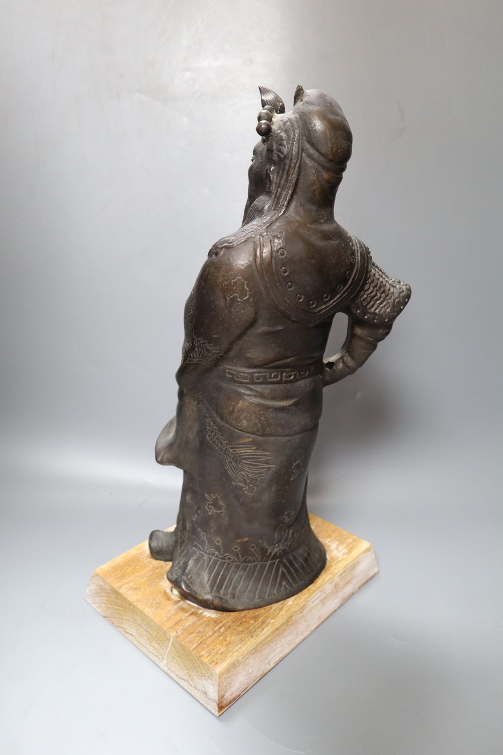 A Chinese bronze figure of Guandi, 42cm